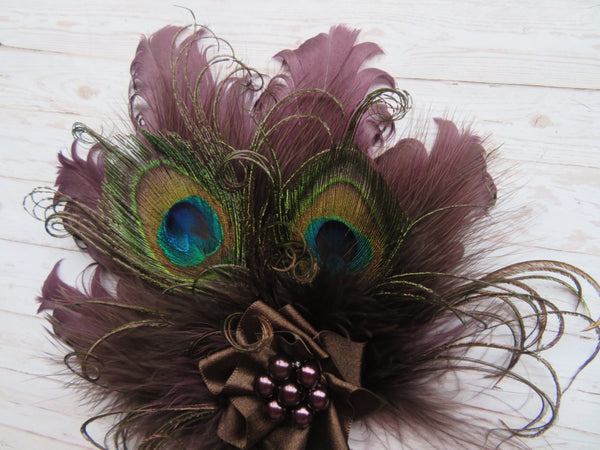 Vintage-style aubergine feather clip with satin ribbon and pearls