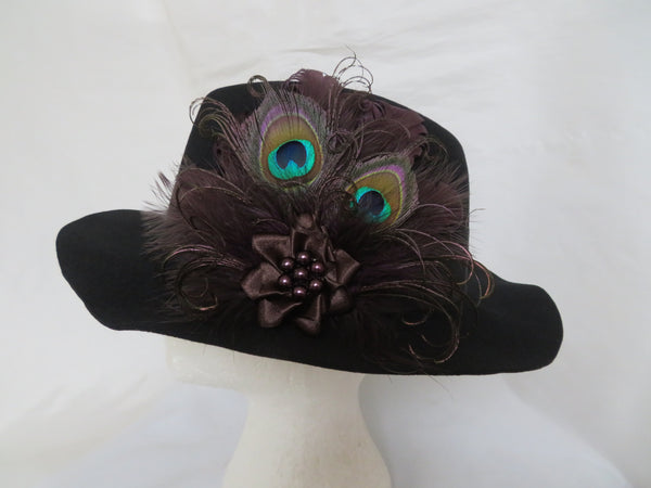 Handmade mini fascinator with aubergine feathers and peacock eye details