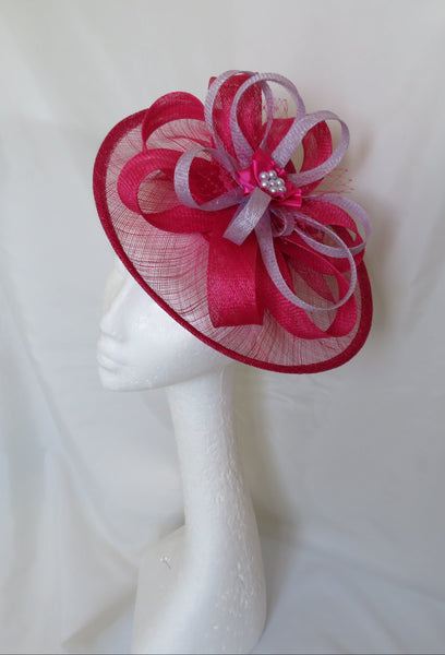 cerise pink and lilac sinamay saucer occasion hat for a wedding or ascot
