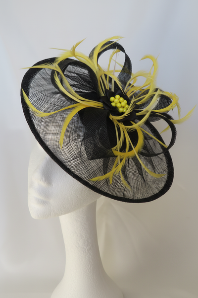 Black fascinator with yellow feathers and beads