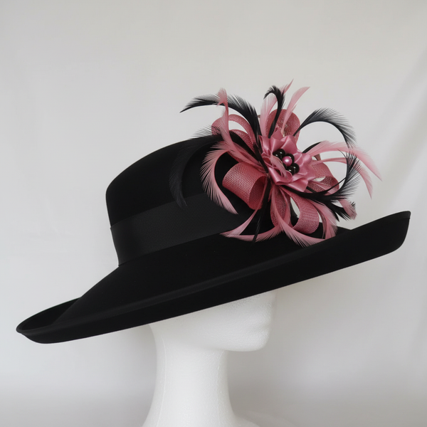 Pink and black fascinator on Ascot-style hat