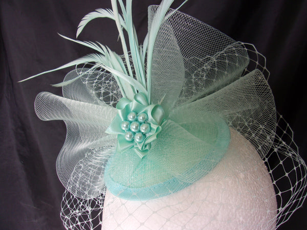 Aqua Vintage Fascinator Aquamarine Blue Blusher Veil Feather Plume Crinoline Bow and Pearl Percher Headpiece Hat Wedding closeup