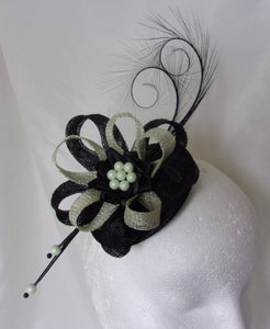 black and pale sage green curl feather and sinamay fascinator mini hat