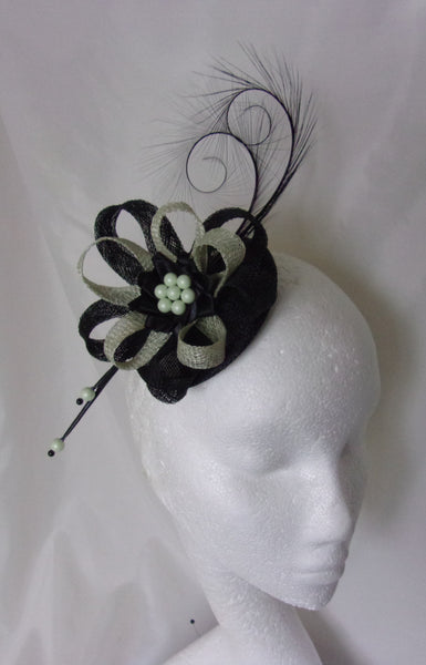 black and pale sage green curl feather and sinamay fascinator mini hat