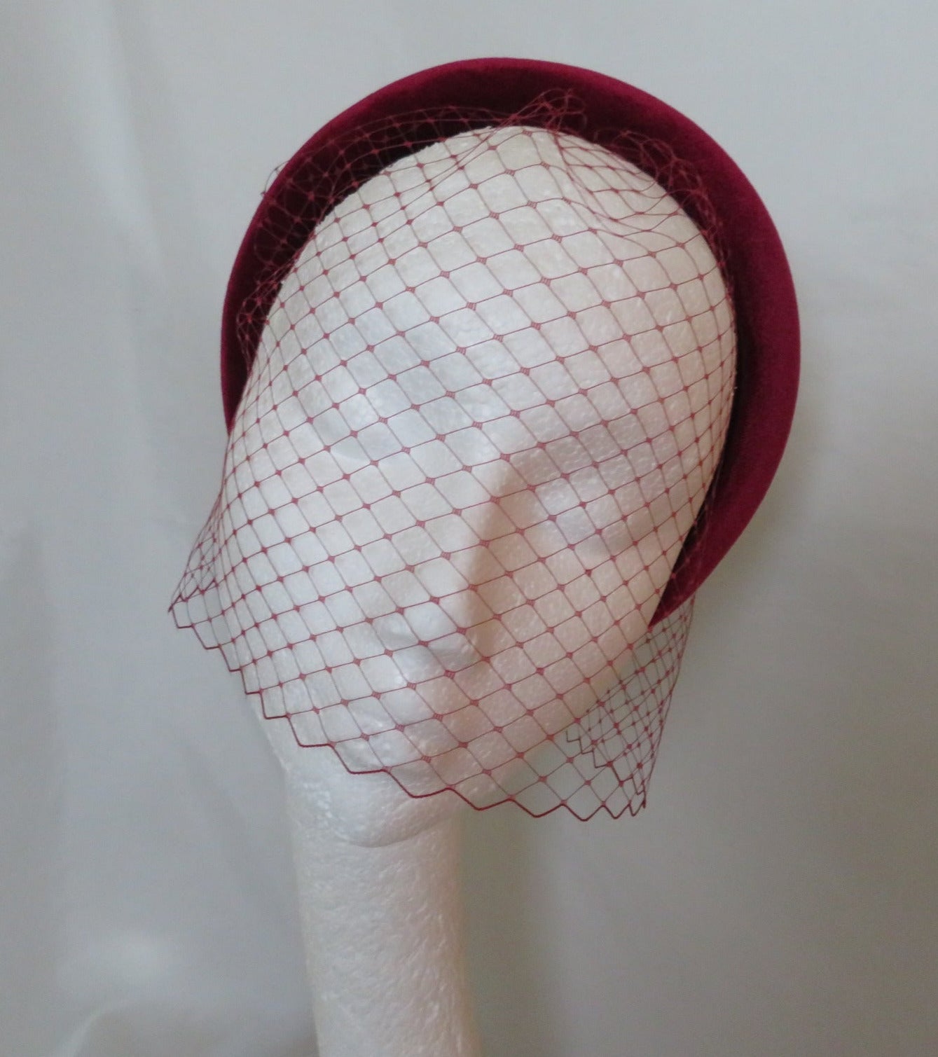 beautiful burgundy wine velvet padded headband with a separate veil which you place in your hair and add the headband on top the veil is classic veiling